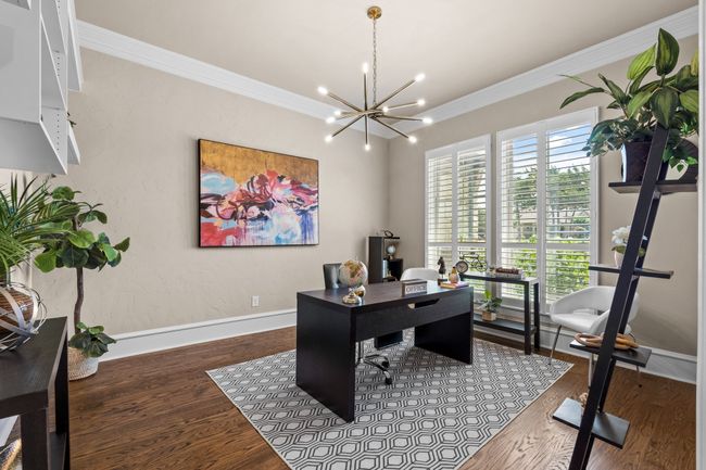 Office space featuring crown molding, a chandelier, and wood finished floors | Image 4