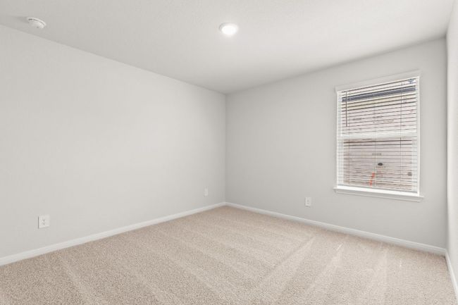 Carpeted bedroom with baseboards | Image 14
