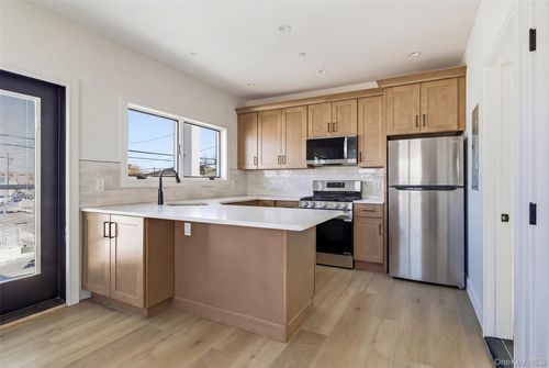 56 Suffolk Rd, Island Park, NY, 11558-2150 | Card Image