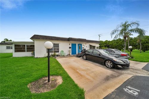 63 Tangelo Ct, LEHIGH ACRES, FL, 33936-7233 | Card Image