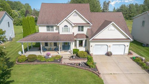 1043 Clubhouse Dr, Weidman, MI, 48893-9339 | Card Image