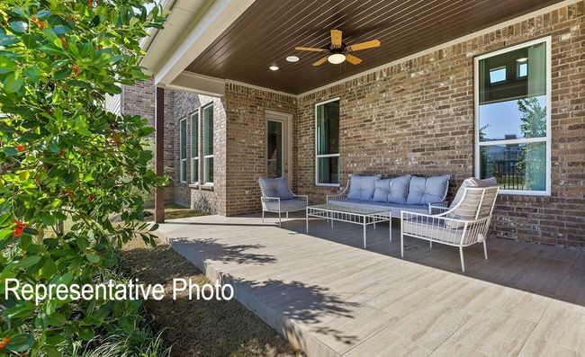 Wooden terrace featuring outdoor lounge area, ceiling fan, and a patio | Image 8