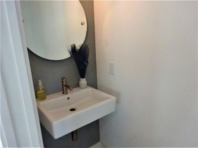 Bathroom with a sink | Image 13