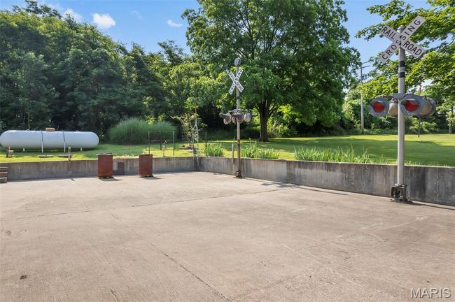 View of basketball court featuring a yard | Image 22