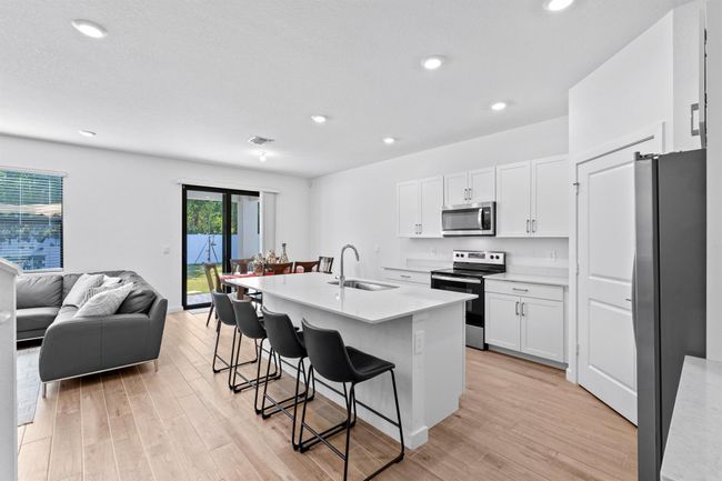 5850 Se Sky Blue Circle, House other with 5 bedrooms, 3 bathrooms and null parking in Stuart FL | Image 6
