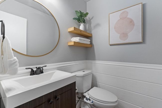 Bathroom featuring vanity and wainscoting | Image 21