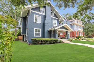 View of front facade with a front lawn | Image 3