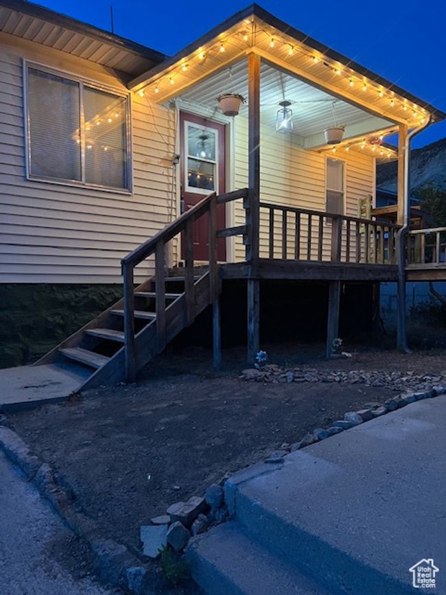 Entrance to property with a wooden deck | Image 25