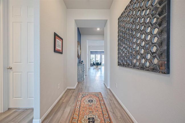 Foyer leading to the open living plan with lots of natural light. | Image 15