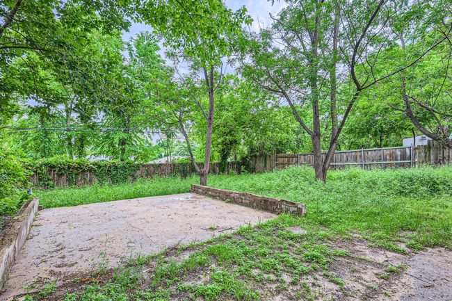 View of yard featuring a patio and a fenced backyard | Image 27