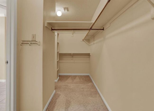 Primary bedroom large walk-in closet | Image 26