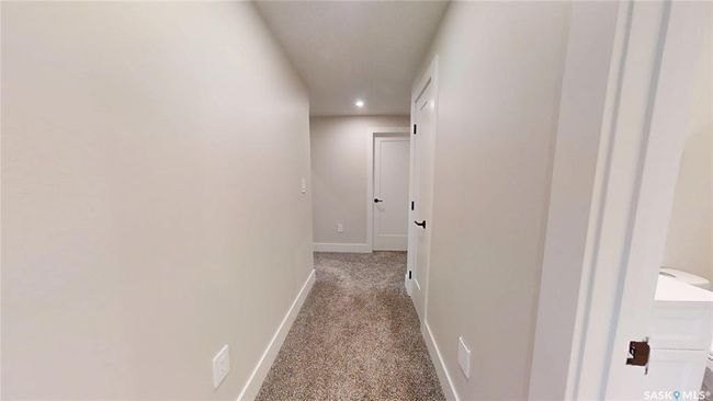 Hall with carpet and recessed lighting | Image 33