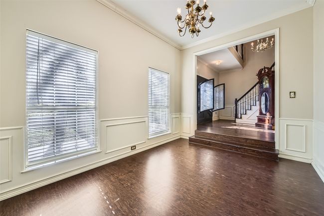 To your right is the front room which could be a formal dining/living room off the kitchen. | Image 15