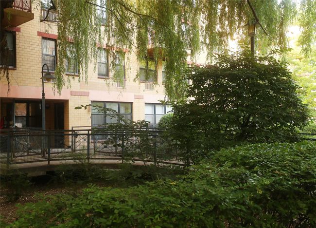 Rear view of house featuring brick siding | Image 4