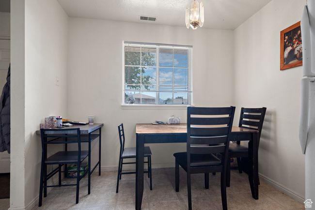 Dining area with baseboards | Image 36