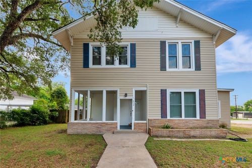 214 Hubbard St, Yoakum, TX, 77995-4122 | Card Image