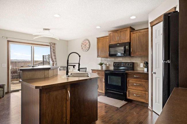 174 Chapalina Terr Se, House other with 4 bedrooms, 4 bathrooms and 4 parking in Calgary AB | Image 5