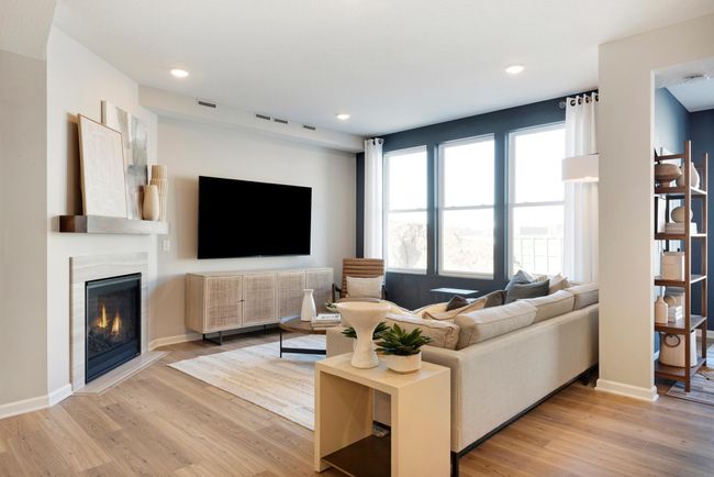 The Ashton living room has more than enough leg room for any furniture configuration you may want! Photo of model home. | Image 6