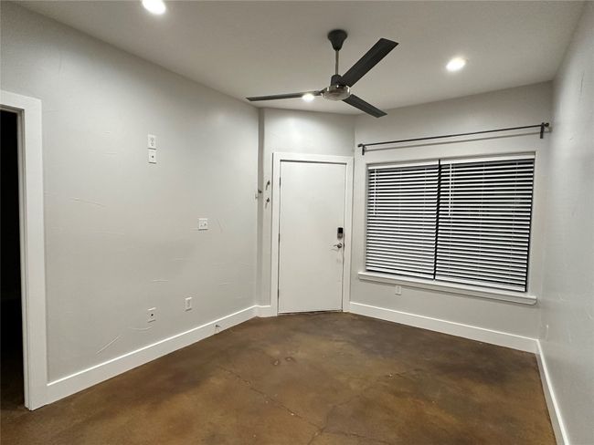 Foyer featuring ceiling fan, concrete flooring, and recessed lighting | Image 6