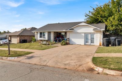 Ranch-style house with a front lawn | Image 2