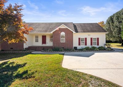 Home has great concrete driveway for parking | Image 3