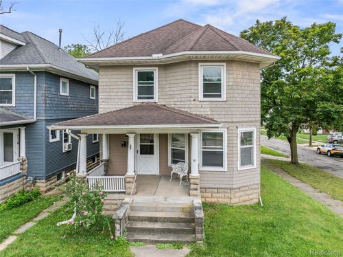 915-913 W Michigan Ave, Jackson, MI, 49202-4105 | Card Image