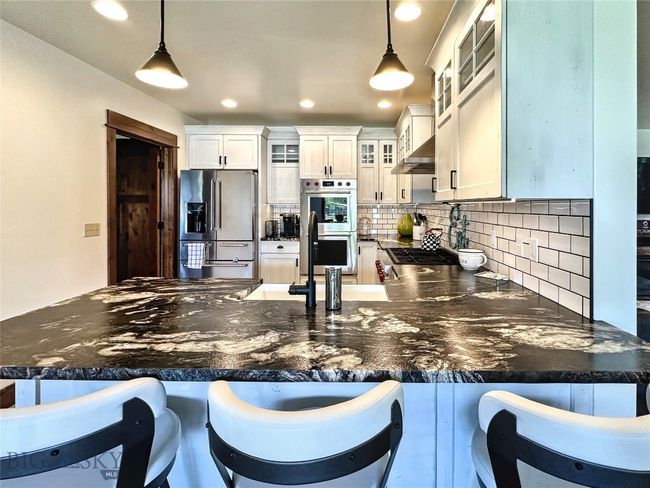 Eating Bar, pendant lights, new cabinets | Image 11