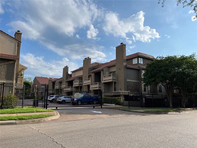 View of property with a residential view and fence | Image 38