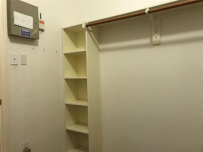 View of spacious closet | Image 13