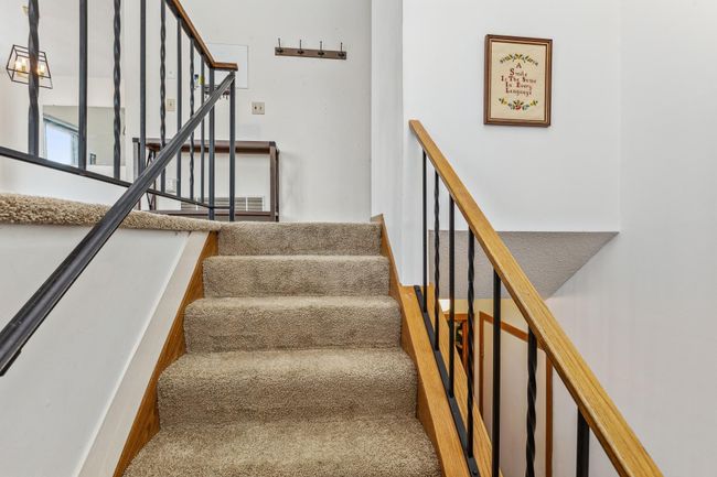 Foyer and stairs to upper and lower levels | Image 16