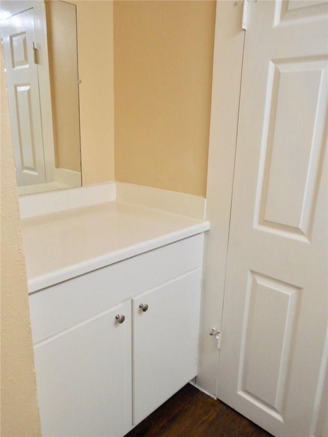 Bathroom with vanity and wood finished floors | Image 14