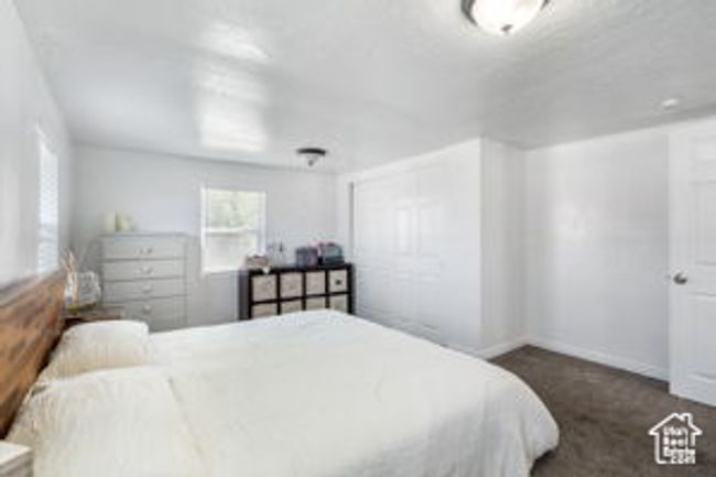 Bedroom with baseboards | Image 14