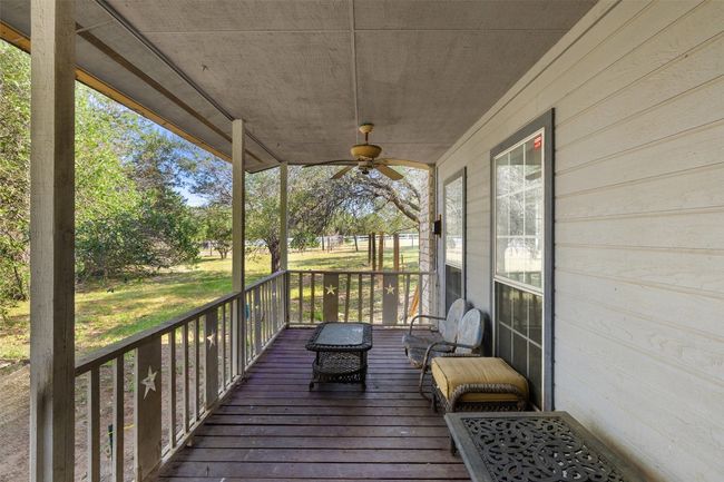 Deck with a ceiling fan | Image 32