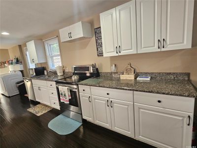 18 - 18 Greenwood Boulevard, Condo with 2 bedrooms, 1 bathrooms and null parking in Manorville NY | Image 2