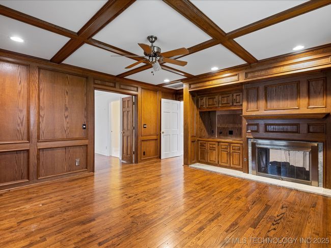 Den shares double fireplace with Formal Living Room | Image 23