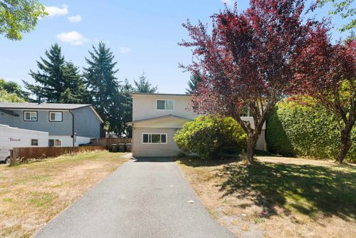 18340 63 A Avenue, House other with 6 bedrooms, 2 bathrooms and 4 parking in Surrey BC | Card Image