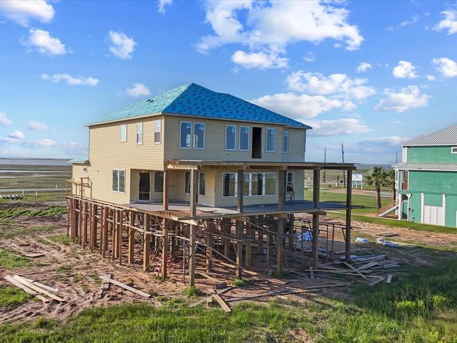 Even in its early stages, this home commands attention. Floor-to-ceiling windows, expansive decking, and a structural footprint engineered to VE-zone standards remind you that this isn’t just a home—it’s a legacy property in the making. | Image 4