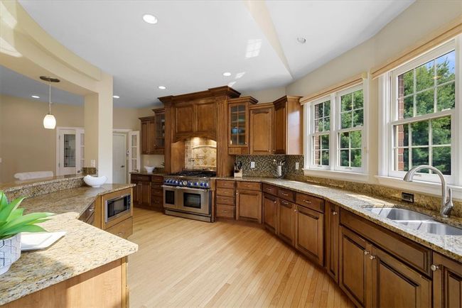 The kitchen provides an abundance of counter work space and plenty of cabinets to keep you organized. | Image 20