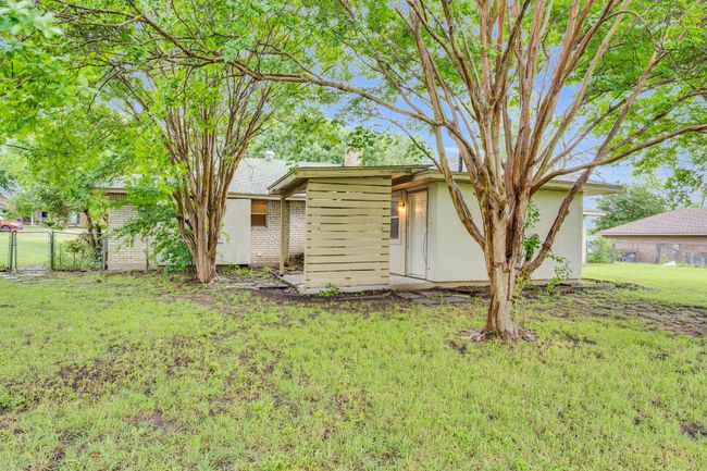 View of outdoor structure featuring fence | Image 6