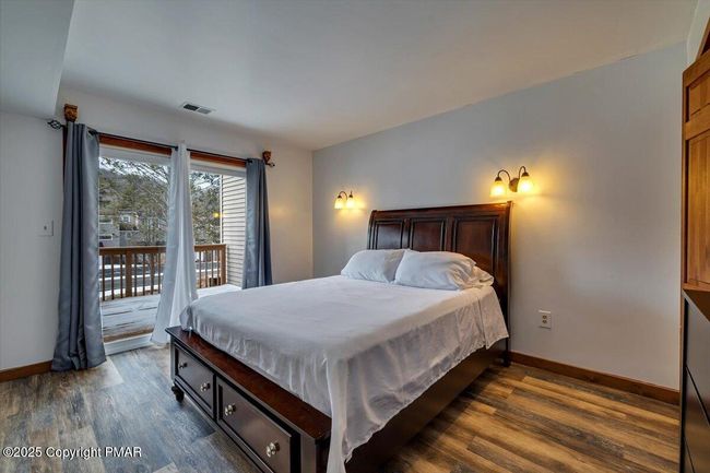Primary Bedroom w/private deck | Image 25