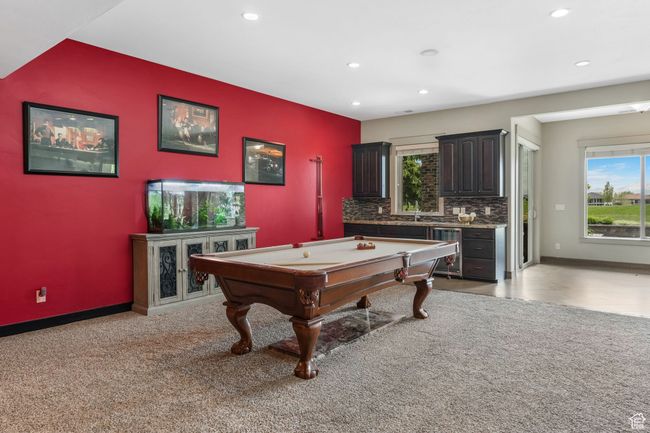Playroom with recessed lighting, billiards, a sink, an accent wall, and baseboards | Image 13
