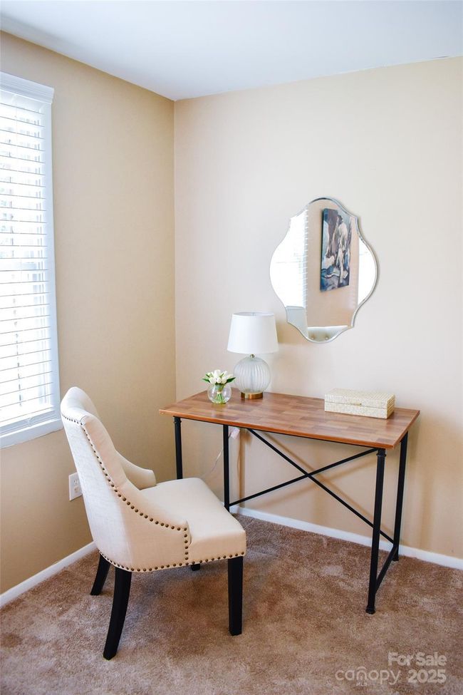 Primary bedroom area used as an office space | Image 20