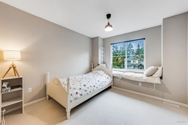 Carpeted bedroom with visible vents and baseboards | Image 18