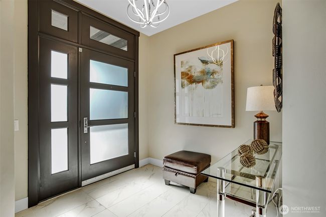 Upon entry, a modern, sophisticated front door will give your visitors a classy first impression. | Image 4