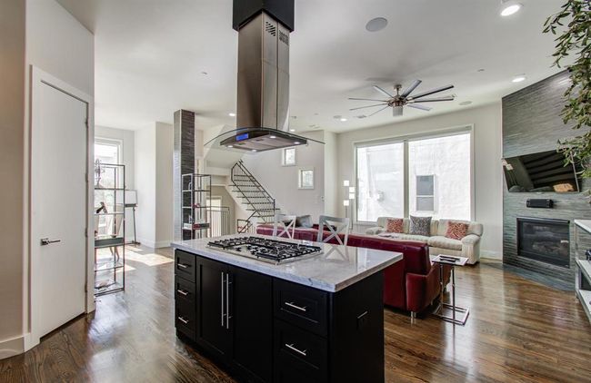 Another view of this stunning kitchen with a large walk-in pantry. | Image 16