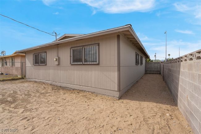 View of home's exterior featuring fence | Image 37