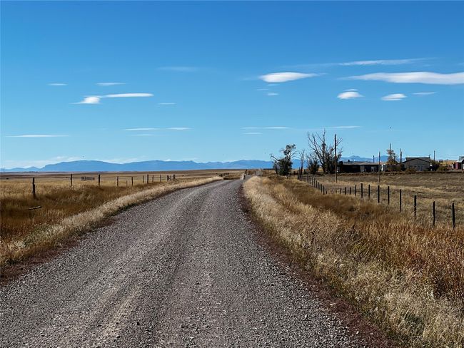 View of street with a rural view and a mountain view | Image 37