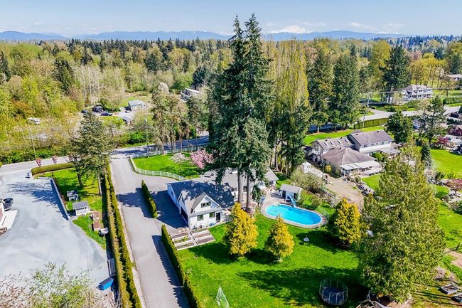 Birds eye view of property with a view of trees | Image 38