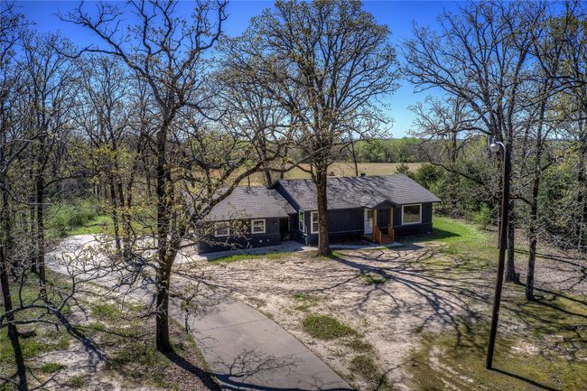 View of front of house with roof with shingles | Image 4