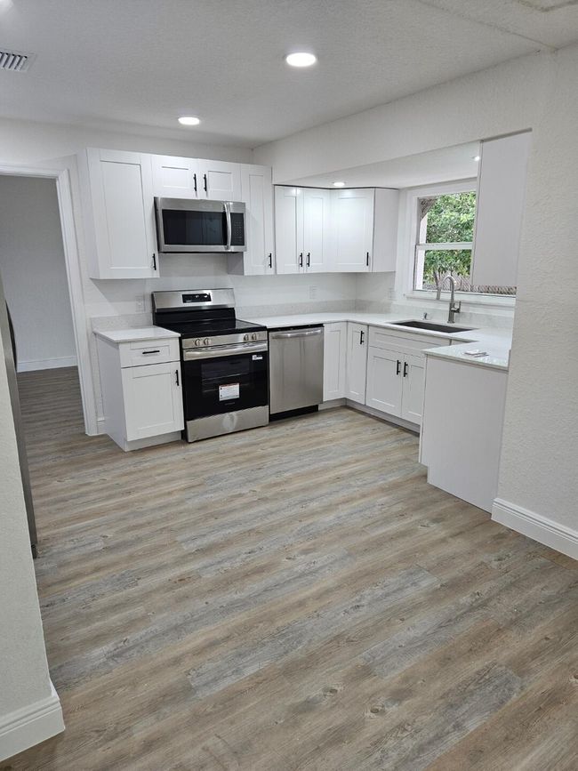 1123 Woodbine Rd, House other with 4 bedrooms, 2 bathrooms and null parking in West Palm Beach FL | Image 4